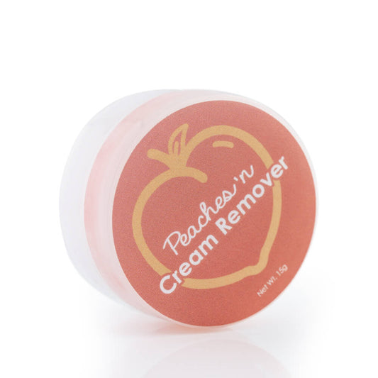 Small round container on white with peach color label. Text reads "Peaches 'n Cream Remover Net Wt. 15g" 