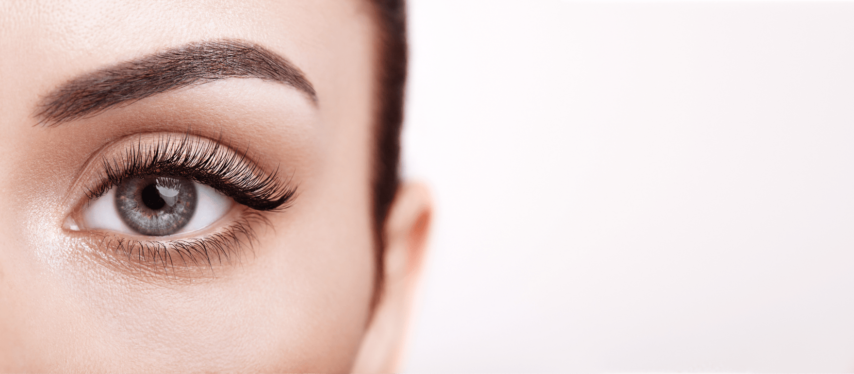 Closeup of a woman’s eye with lash extensions