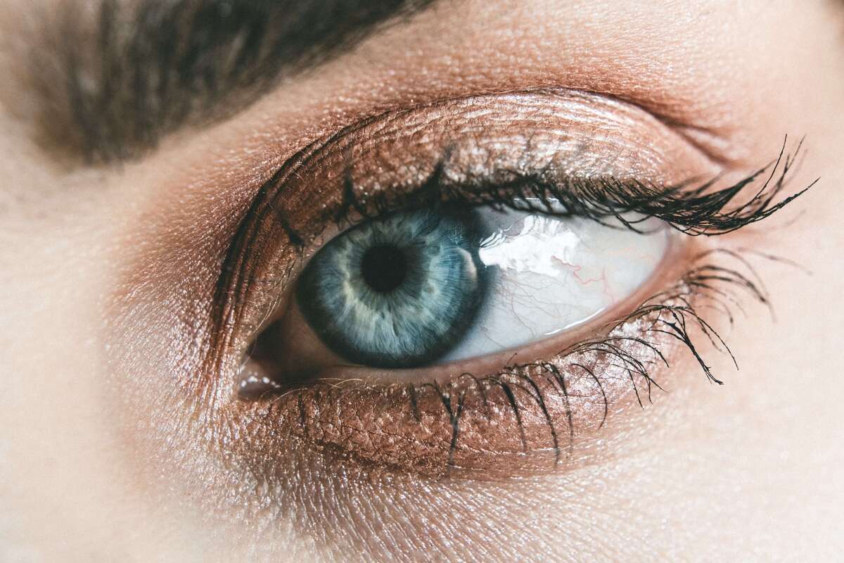 a close up photo of a woman’s eye