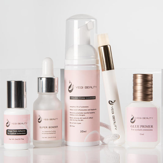 Retention set includes eyelash extension glue, bonder, cleaner and primer with cleaning brush