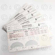 Stack of mapping sheet booklets from Yegi Beauty. Perfect for eyelash extension artists