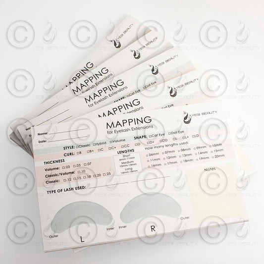 Stack of mapping sheet booklets from Yegi Beauty. Perfect for eyelash extension artists